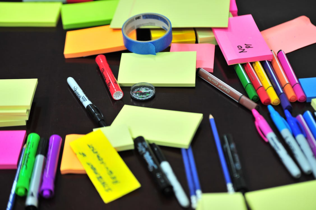 Colorful sticky notes on a desk showing accidental product inventions that changed everyday life