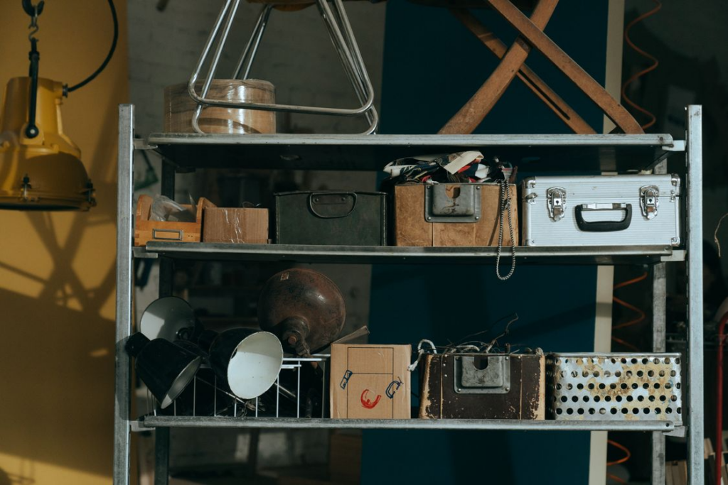 Basement shelves with old boxes and forgotten objects showing things found in attics and basements