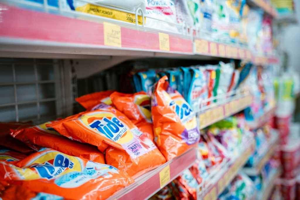 Supermarket shelves with recognizable products showing household name brands