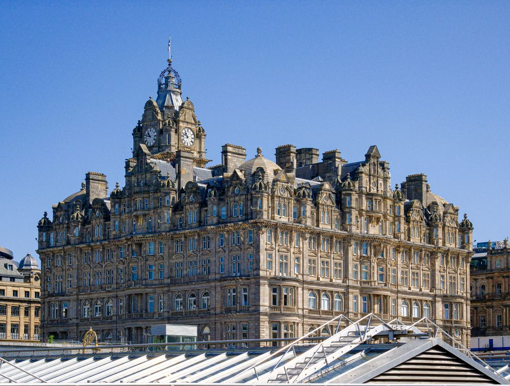 The Balmoral Hotel exterior showing historic hotels with stories of architecture and past travelers.