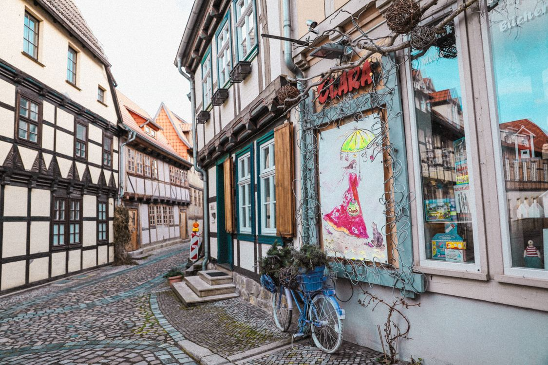 Cobblestone street with preserved buildings showing historic neighborhoods to visit for culture and architecture