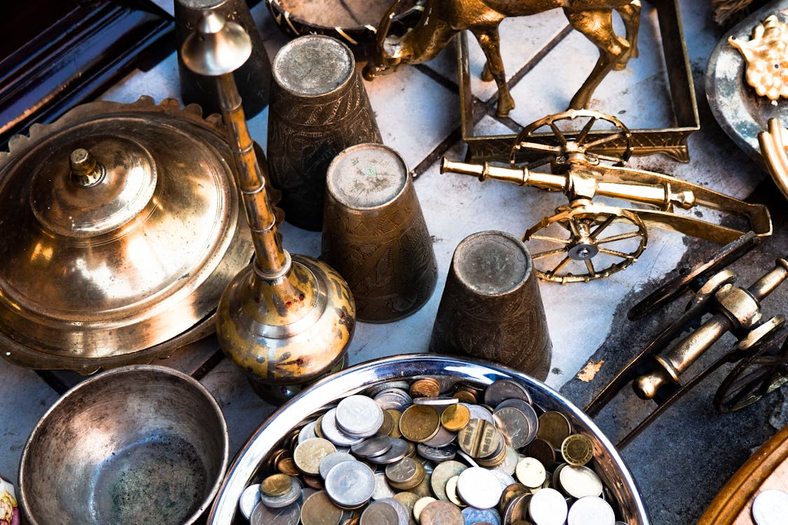 Antique coins and vintage objects illustrating how collections start with simple curiosity.